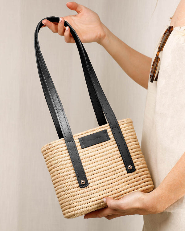 Noor-Black and Natural-Large Tote-Front-2-Wicker-Wings-Wicker-Bag-Bucket-Bag-Bags-for-Women-Designer-Handbags-Beach-Bag-Summer-Bag-Straw-Bag-Black-Bag-Crossbody-Bag-Mini-Bag-Leather-Handbags-Purse