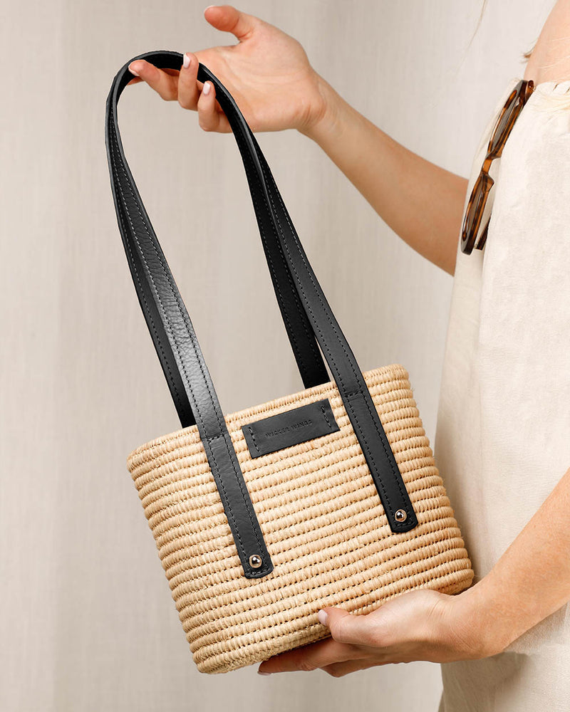 Noor-Black and Natural-Large Tote-Front-2-Wicker-Wings-Wicker-Bag-Bucket-Bag-Bags-for-Women-Designer-Handbags-Beach-Bag-Summer-Bag-Straw-Bag-Black-Bag-Crossbody-Bag-Mini-Bag-Leather-Handbags-Purse